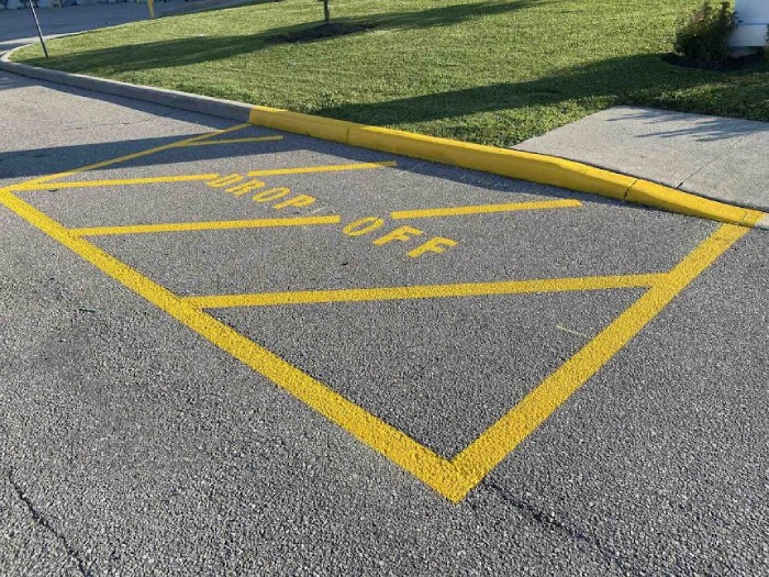 Custom Pavement Signs That Make Parking Lots Safer and More Professional