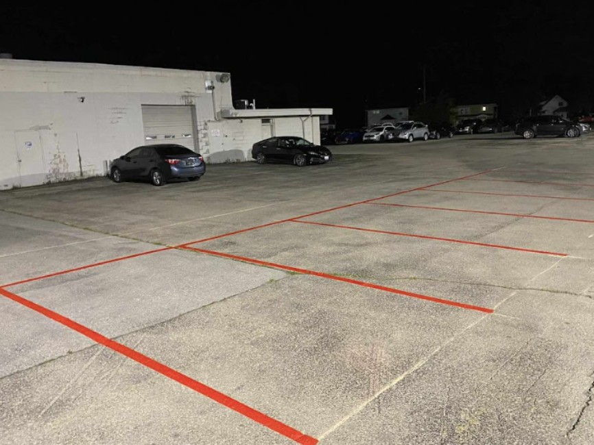 Parking lot line striping