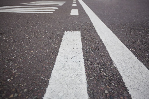 White line markings on the road