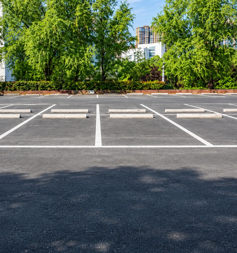 Parking lot with white line markings.