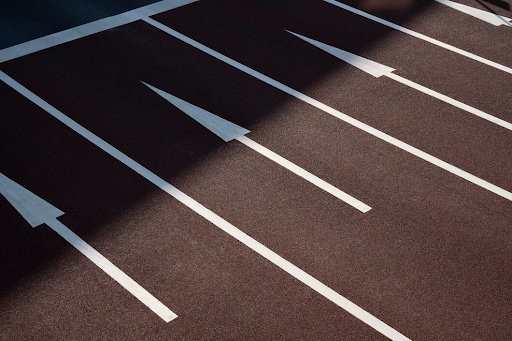 White road arrows and lane markings.